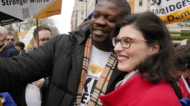 Layla Moran A man taking a selfie with Layla Moran
